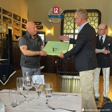 Blue Marlin (FIN-1) owner, Henrik Andersin receives 2nd place Daily price from Stanton-Chase Managing Partner, HSS Commodore and Vanity V (K-5) skipper, Mikael Stelander