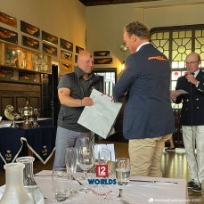 Flica II (K-14) owner, Alexander Falk receives 3rd place Daily prize from Stanton-Chase Managing Partner, HSS Commodore and Vanity V (K-5) skipper, Mikael Stelander